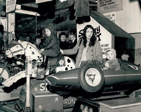 Children having fun on the Champion the Wonder Horse ride in the City Arcade in 1970.