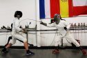 Gayle has a bash at fencing with Rob Blackburne at Salle Ossian Fencing Club in Perth.