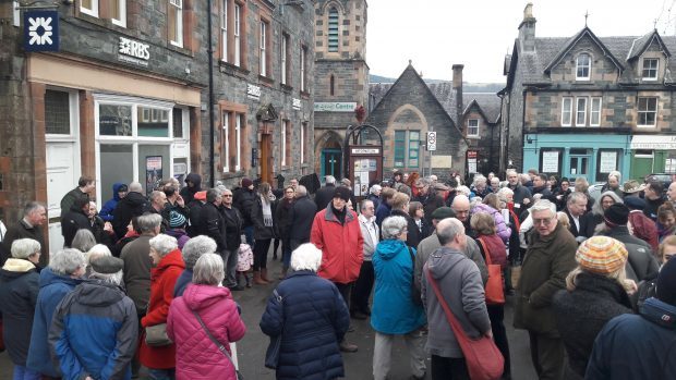 Protesters gather outside the RBS branch in Aberfeldy.