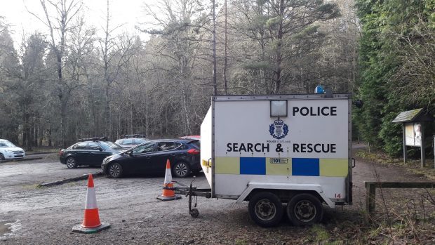 Police search and rescue crews found a vehicle belonging to one of the missing walkers at the Glen Tilt car park.