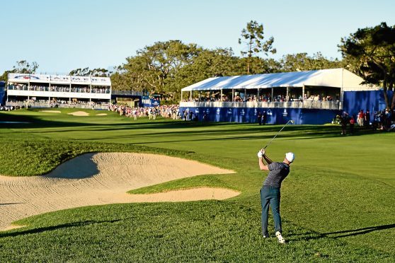 SAN DIEGO, CA - JANUARY 28:  Alex Noren of Sweden plays a shot from a bunker on the 18th hole during the second playoff in the final round of the Farmers Insurance Open at Torrey Pines South  on January 28, 2018 in San Diego, California.  (Photo by Donald Miralle/Getty Images)