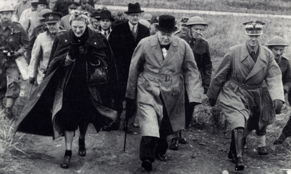 Prime Minister Winston Churchill inspects Polish forces at the West Sands, St Andrews, in 1940 with General Sikorski during the Second World War.
