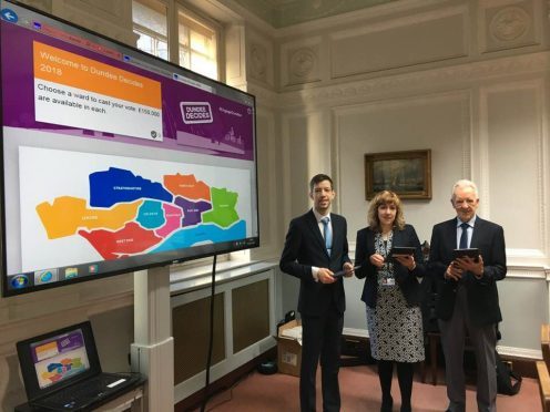 Council leader John Alexander, executive director of Neighbourhood Services Elaine Zwirlein and outgoing Citizen of the Year George Roberts launching Dundee Decides.