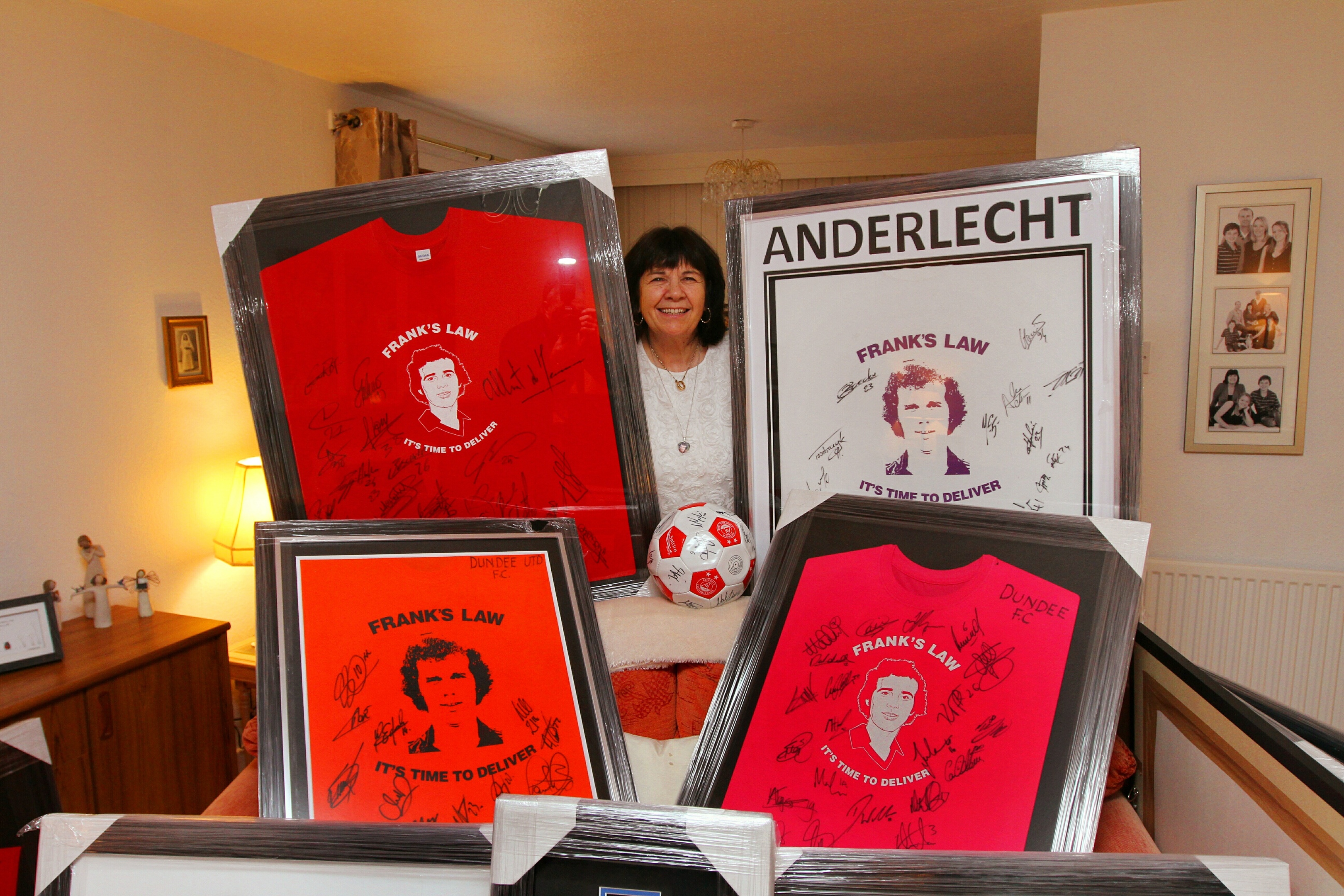 Mrs Kopel with just some of the shirts to be auctioned off.