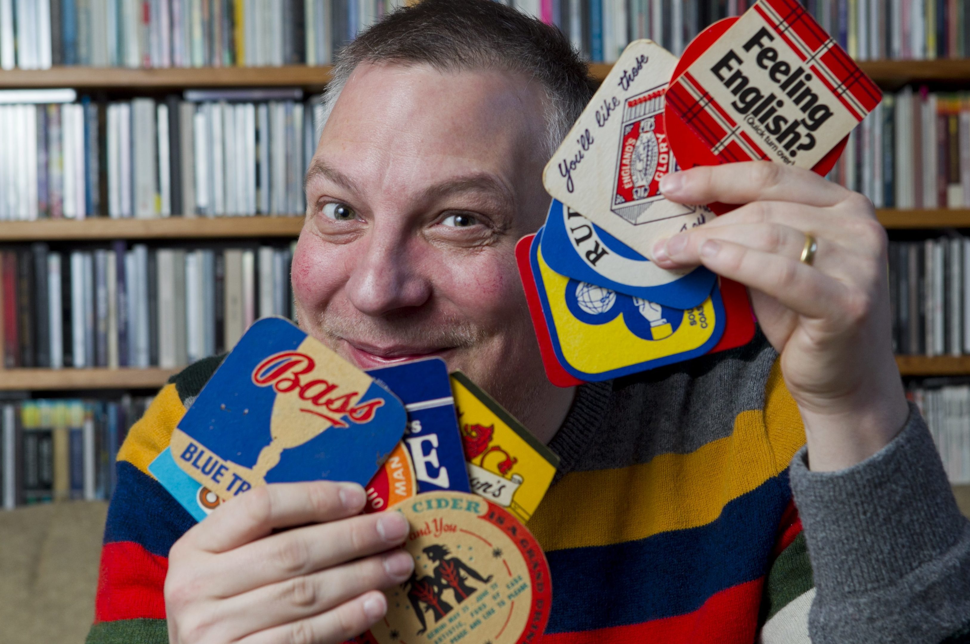 Dundee man Jan Burnett -  record, beer mat, and gig poster collector -  at his home in Glasgow
