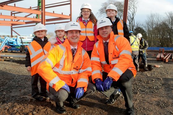 Pupils Alfie Dodds, Sandra Albenaite, Kara McDonald and Jaikob Watson with head teacher Simon Gallow and Councillor Derek Wann, at Muirfield Primary School.