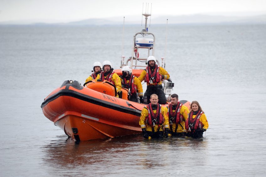 The crew of the Kinghorn lifeboat oversaw the dook.