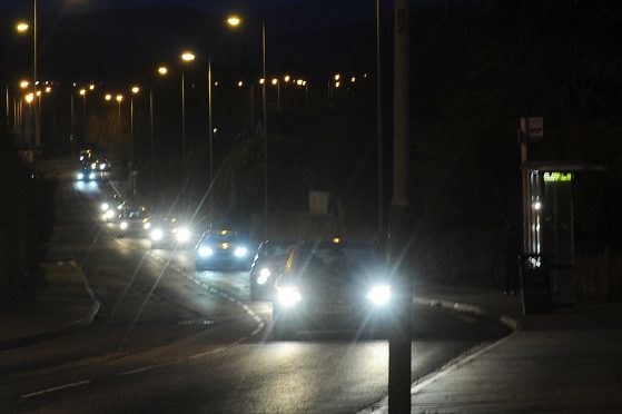 Cars making their way along Perth Road, Dundee.