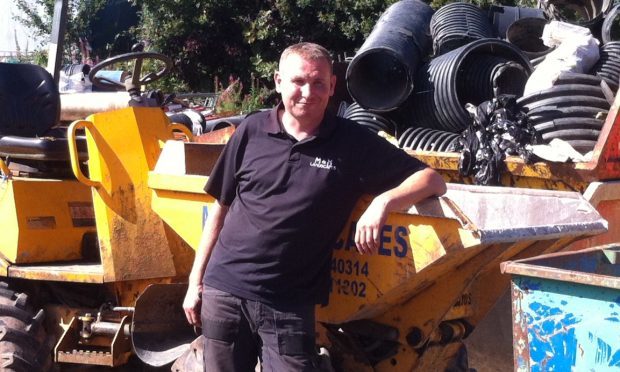 Kevin McNab with his dumper truck