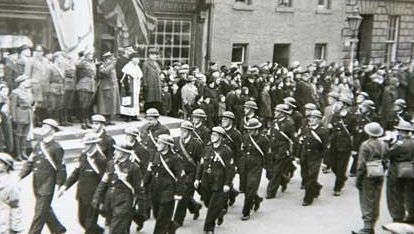Polish soldiers march down Bonnygate, Cupar, in 1942