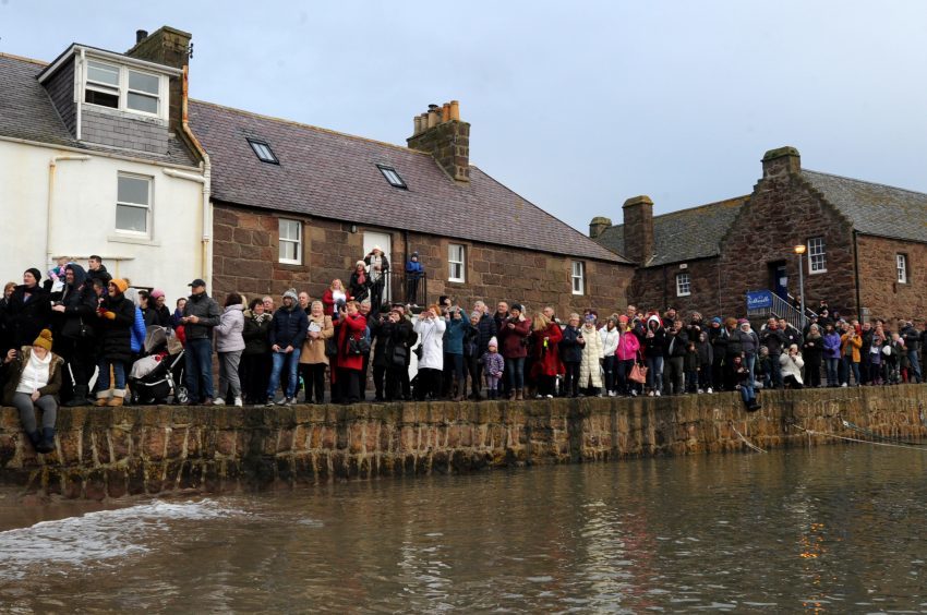 Crowds line up to watch Stonehaven's dook. Pic: Kenny Elrick.