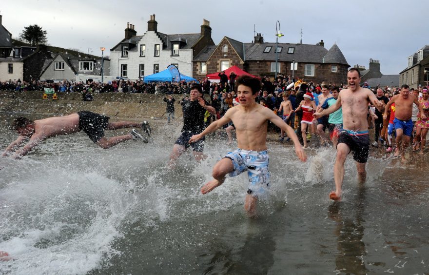 Over 100 people braved the cold in Stonehaven.  Pic: Kenny Elrick.