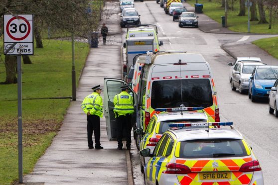 Several Police and vehicles at address on Firbank Road, Letham area of Perth.