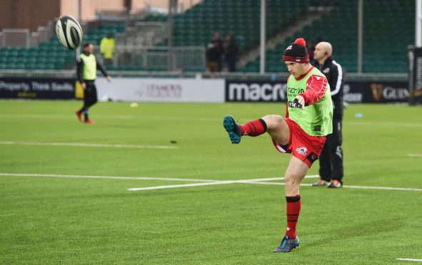 Mark Bennett gets in some kicking practice during training with Edinburgh at Myreside.