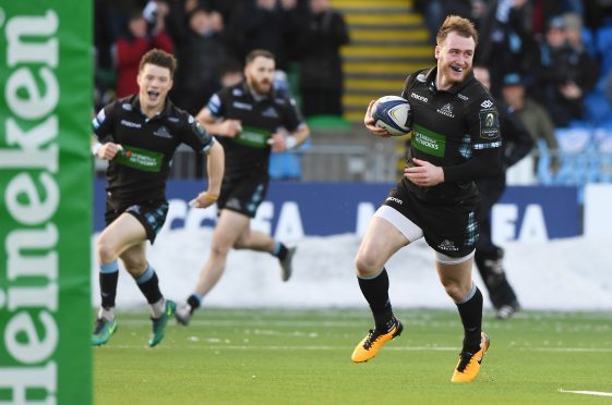 Stuart Hogg strolls in with the opening try at Scotstoun.