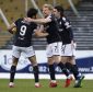 The Dundee player celebrate their first goal.