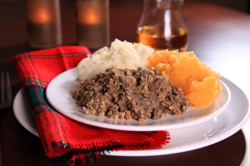photo shows a plate of haggis, mashed potatoes and turnip.