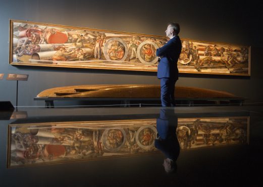 Philip Long viewing one of the Ocean Liners: Speed and Style exhibits in London.