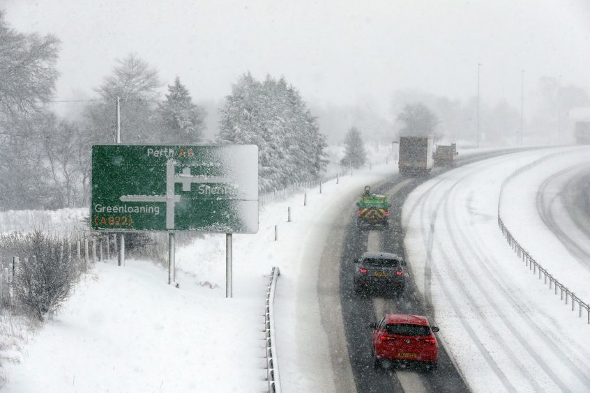 Cars travelling on the A9, near the junction for Braco and Greenloaning.