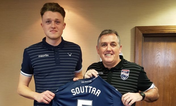 Harry Souttar with Ross County manager Owen Coyle.