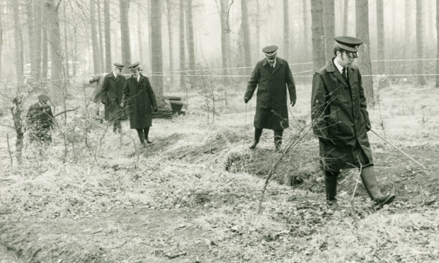 Police search Templeton Woods in 1979 following the murder of Carol Lannen.
