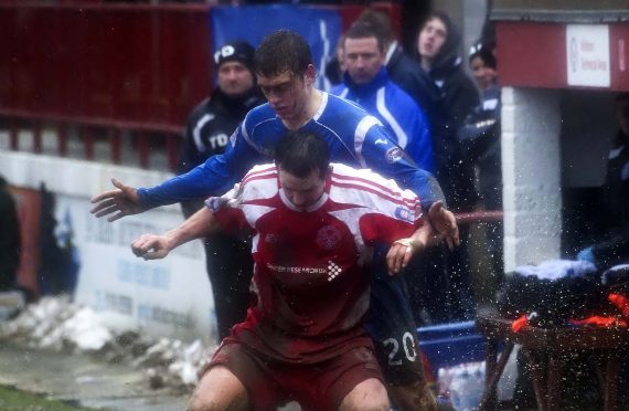 Murray Davidson in the Glebe Park mud.