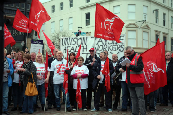 Ninewells Hospital porters holding a rally during their strike in 2015.