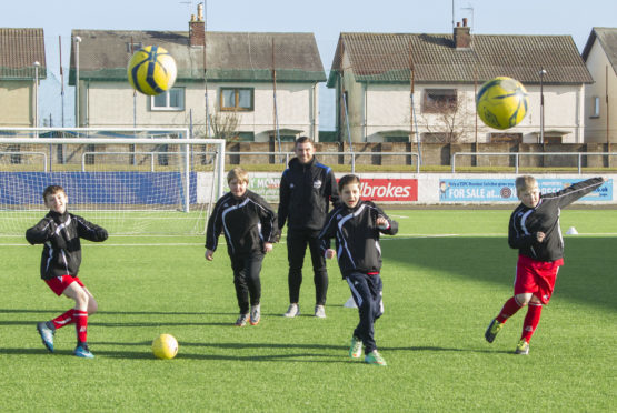 Montrose FC development officer Adam McWilliam coaching youngsters at Links Park.