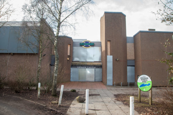 The boarded-up leisure centre.