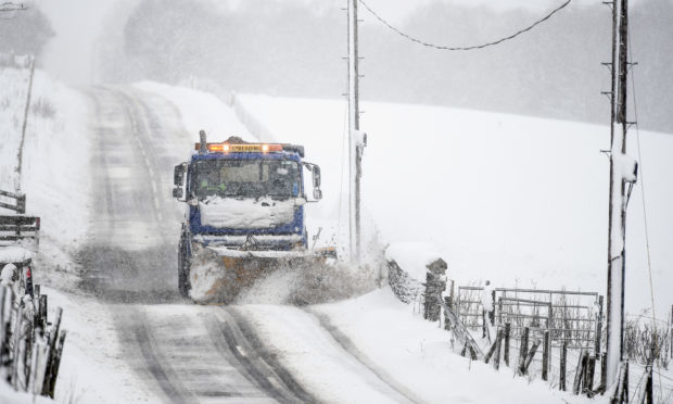 A snow plough on the A93 at the Spittal of Glenshee.