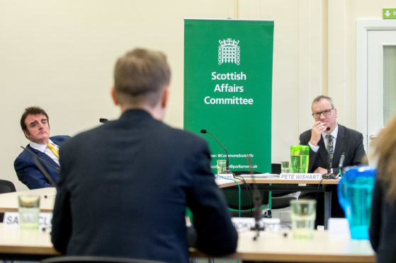 MPs Tommy Shephard and Pete Wishart hear evidence from Fife migrants.