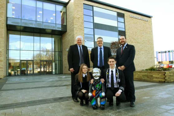 School captains Alix Barclay, left, and Scott Oswald with, from left, Paul Glancy, Kenny Hearn and Gregor Murray at the first day of the new Baldragon Academy.