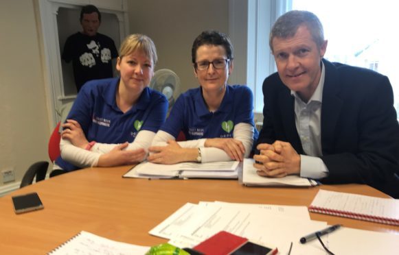 Willie Rennie is pictured with East Neuk First Responders Gillian Duncan and Emma Gilmour who want the Scottish Ambulance Service to use Good Sam.