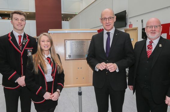 L-R: Head Boy Ben McKay; Head Girl Lauren Donaldson; Deputy First Minister John Swinney; Headteacher Iain Hughes