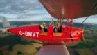 James Crawford in a 1945 Tiger Moth biplane, flying over the Strathearn Valley.