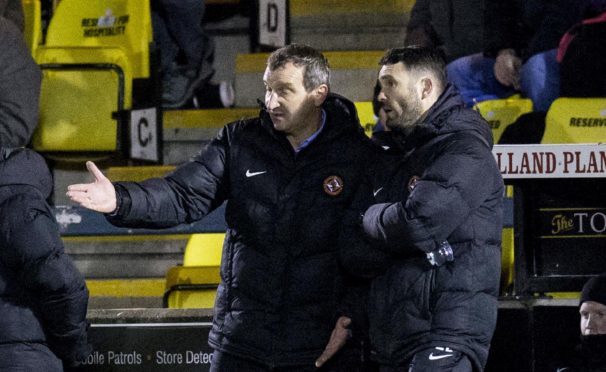 Csaba Laszlo with his assistant Laurie Ellis during the Livi match.