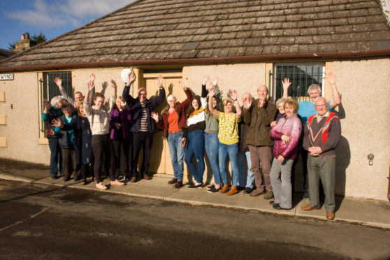 Locals celebrate after news of the funding was confirmed.