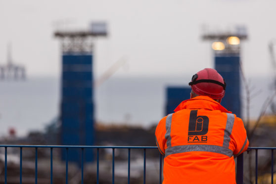 A worker looks out over the yard at BiFab in Methil.