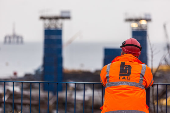 A worker looks out over the BiFab yard at Methil.