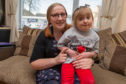 Mum Leanne Howie (pictured with daugher Robyn) is now approved to teach Makaton sign language