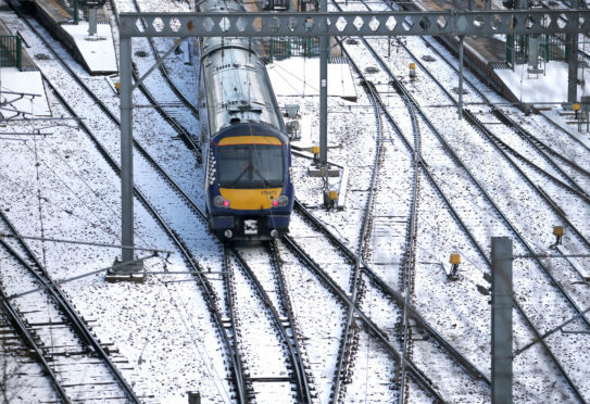 A ScotRail train leaves Edinburgh's Waverley Station.