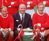 Sir Matt Busby next to two of his legendary Manchester United players.