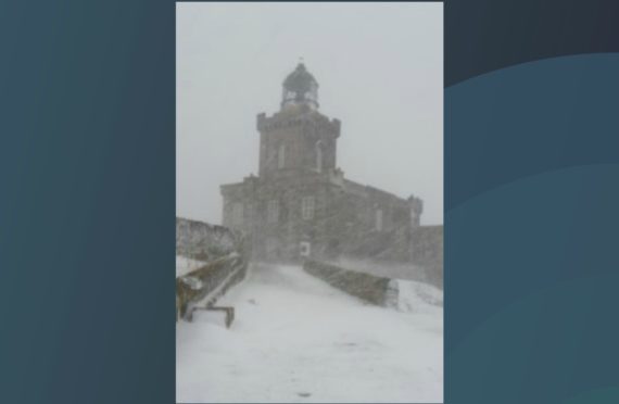 A rare picture of the Isle of May's lighthouse amidst a blizzard as the storm set in on Tuesday