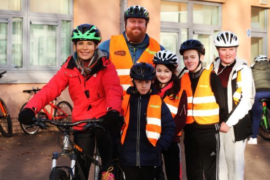 Pupils at Ballumbie Primary School enjoy a bikeability session with Grant Pettigrew and Gayle Ritchie.