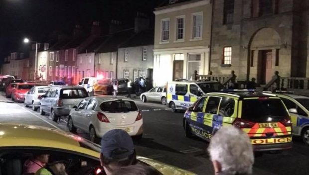 Armed police rushed to the incident in Newburgh High Street.