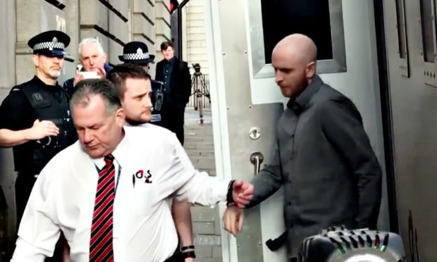 Robbie McIntosh arrives at the High Court in Aberdeen.
