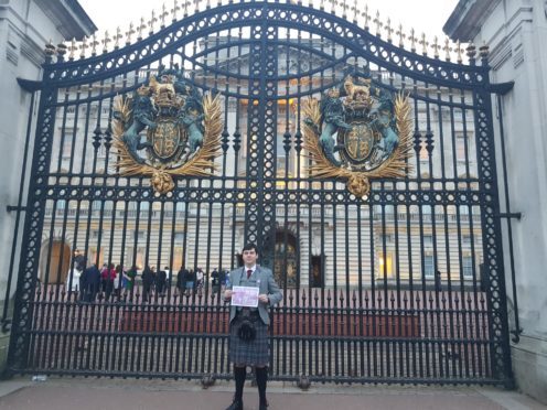 Alex Bann at Buckingham Palace.