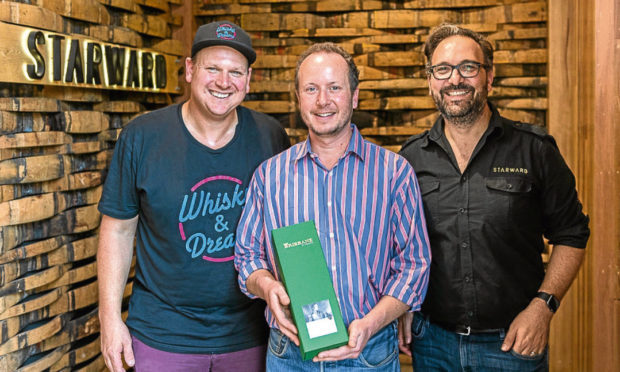 Ben Baranow, organiser of the Whisky and Dreams festival, Alex Bruce of Fife-based Adelphi, and David Vitale of Starward Distillery, with The Brisbane whisky.