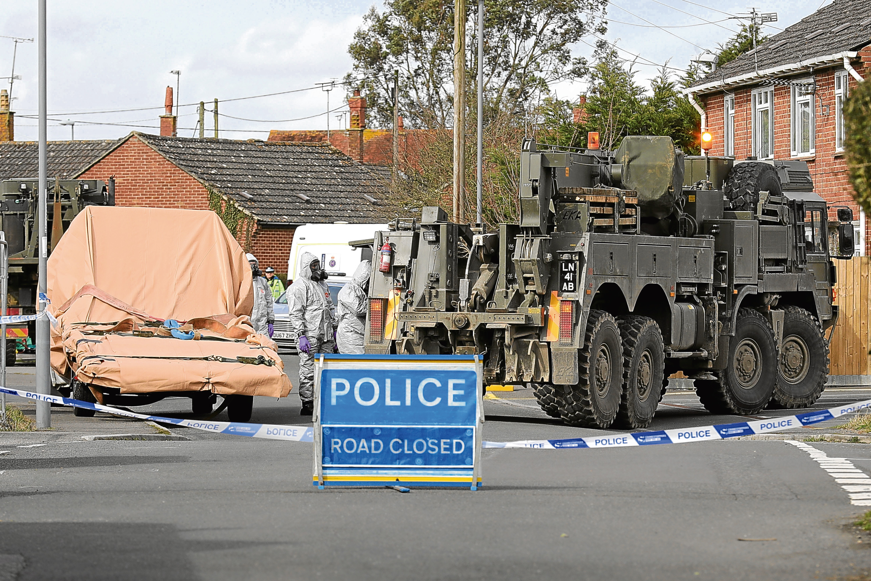 Forensic teams work at an address in Gillingham, Dorset, as they remove a recovery truck used following the Salisbury nerve agent attack on Mr Skripal and his daughter.