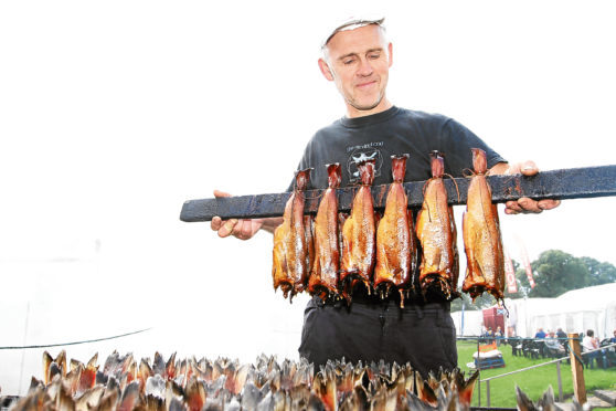 Mhairi Edwards, Evening Telegraph and Courier, Dundee's Flower and Food Festival has begun with lots of exhibits of flowers, food demos and fun for all. 
Picture shows; Iain Spink, Owner of the Original Smokies From Arbroath. Friday 1st September.